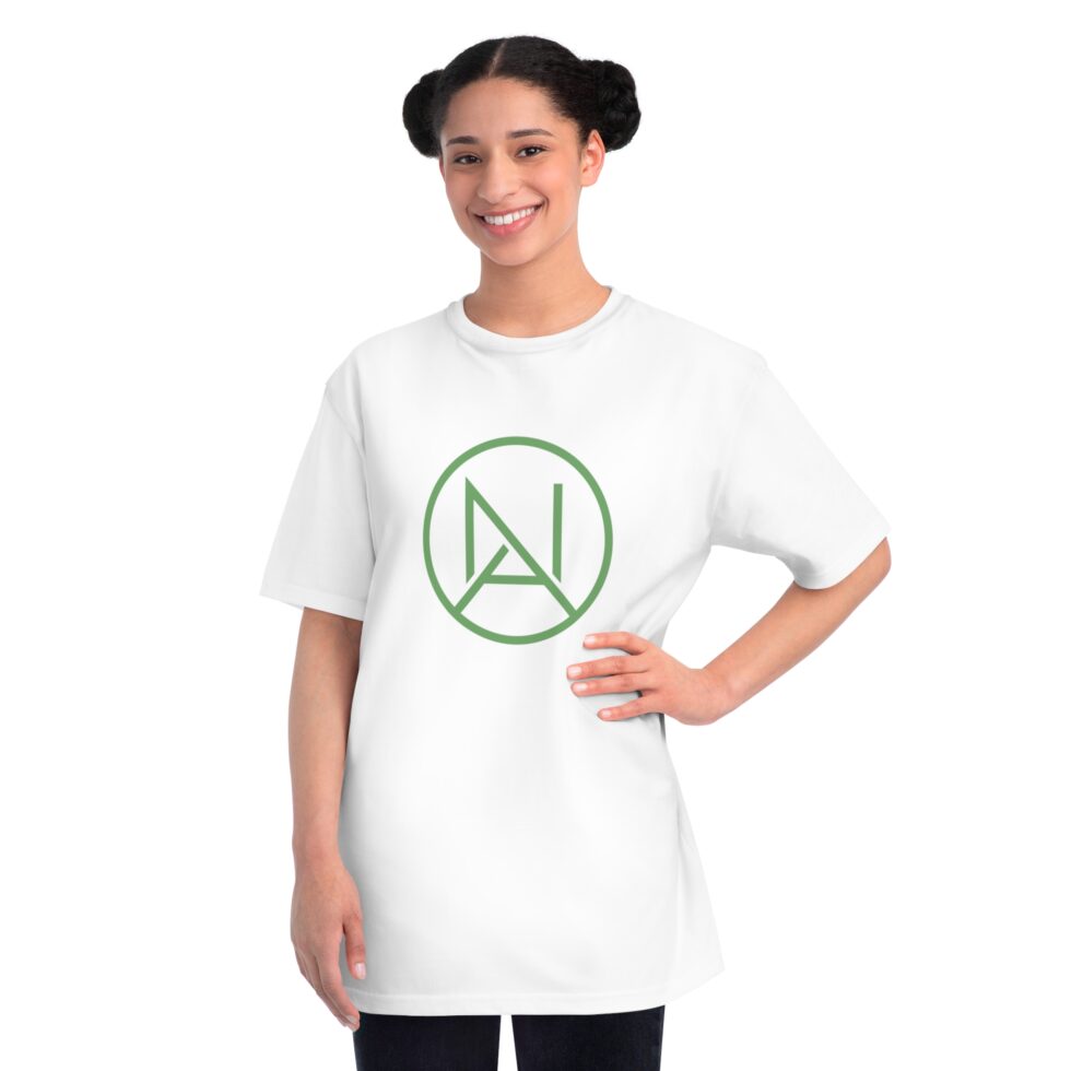 A photo of a female latin model wearing a white tee shirt with a green minimalist NA tee shirt design.