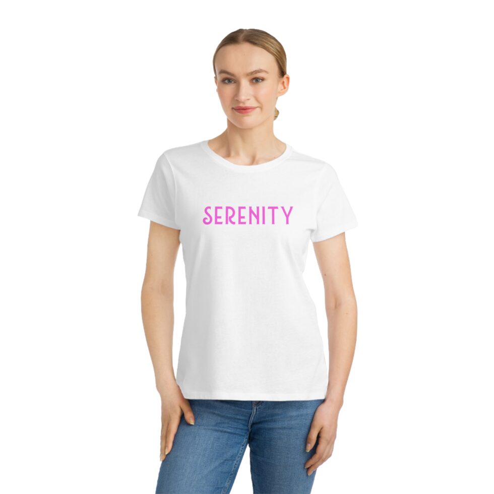 photo of a Young female natural model wearing a walnut color unisex tee shirt with a grey minimalist grey graphic NA tee shirt design.